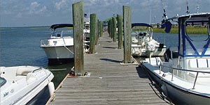 boats docked at a pier on Dewees Island, South Carolina